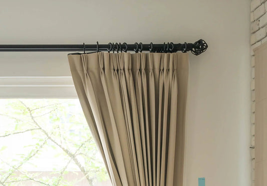 How Far Above the Window Should I Fit My Curtain Pole?